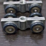 Εξαρτήματα Μηχανισμού Συρόμενων Θυρών Άσκαφτου με Ράουλα Ρουλεμάν Συρτεξ Νο610 (χωρίς τον οδηγό αλουμινίου)