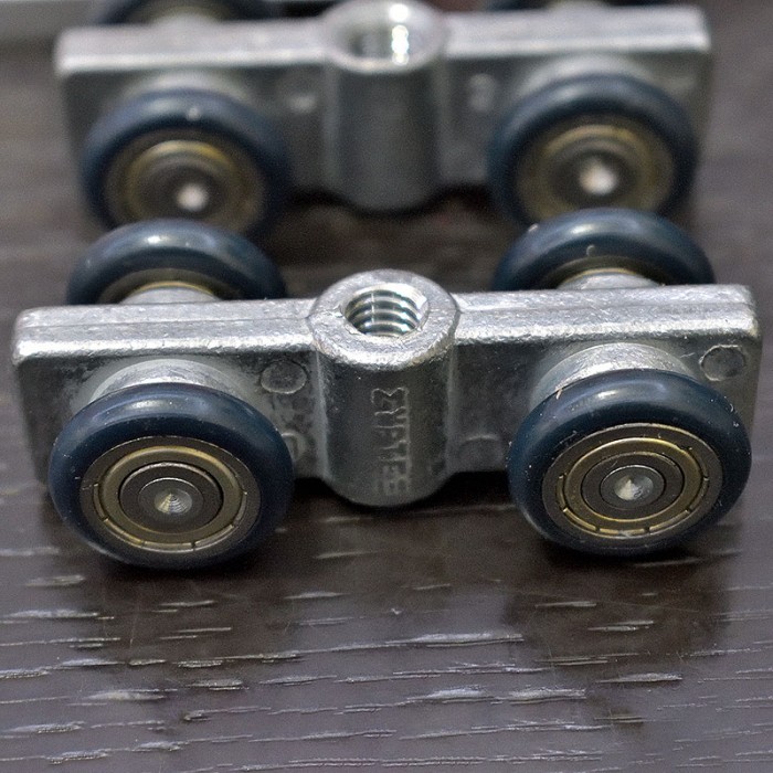 Εξαρτήματα Μηχανισμού Συρόμενων Θυρών Άσκαφτου με Ράουλα Ρουλεμάν Συρτεξ Νο610 (χωρίς τον οδηγό αλουμινίου)