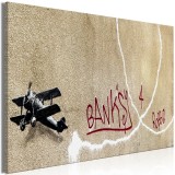 Πίνακας ζε καμβά - Banksy's Plane (1-part) - Red Graffiti Text on Mural Background